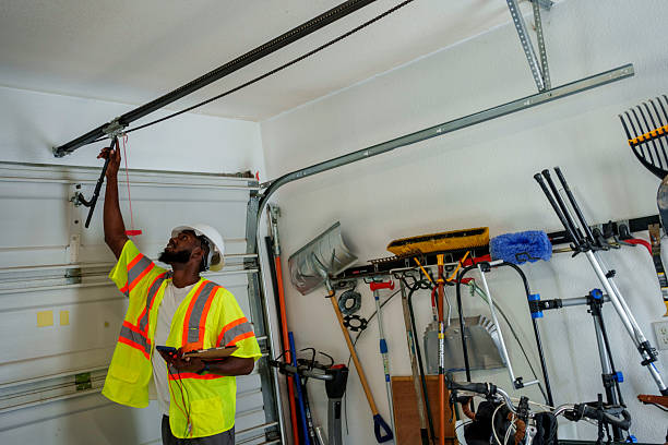 Professional Garage Door Panel Replacement technician working in Oswego, NY